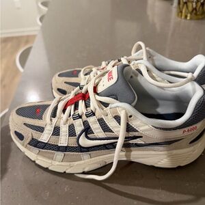 Nike P-6000 in Beige and Dark Blue with Red Accents
